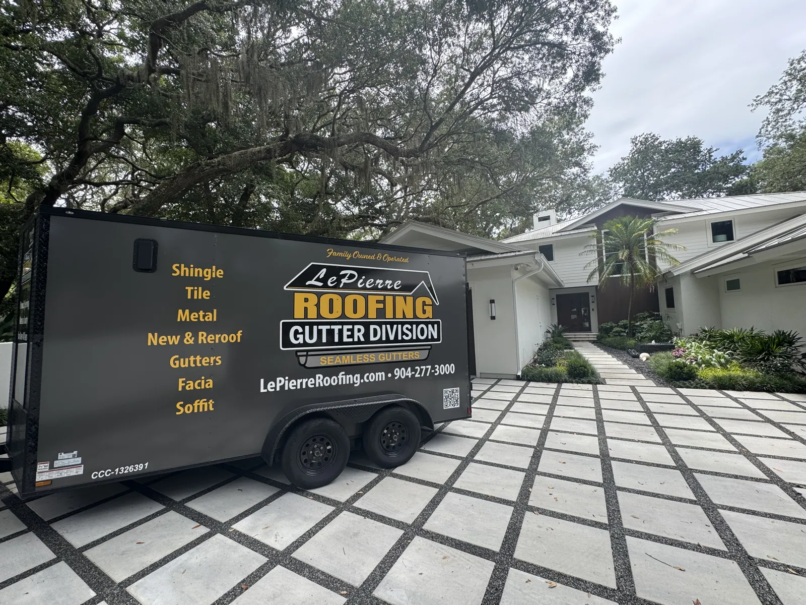 LePierre Roofing Gutter Division trailer at a finished home