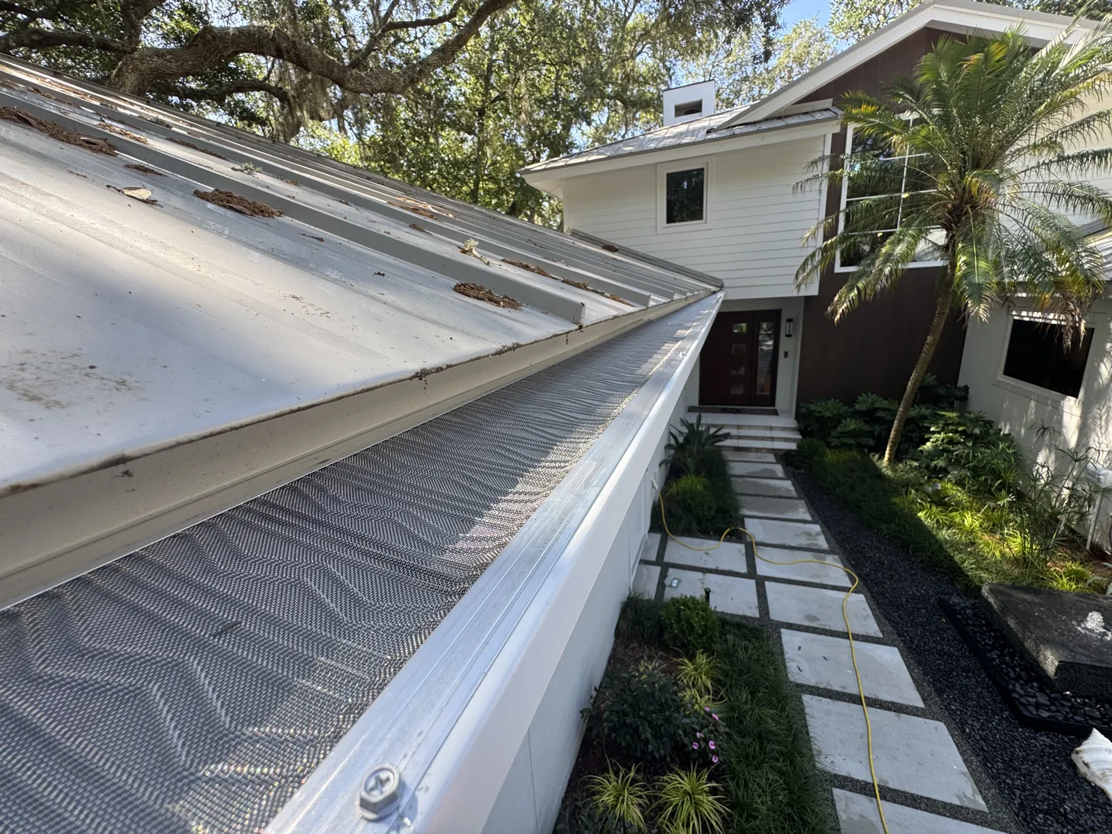Gutter guard installed by LePierre on a metal roof