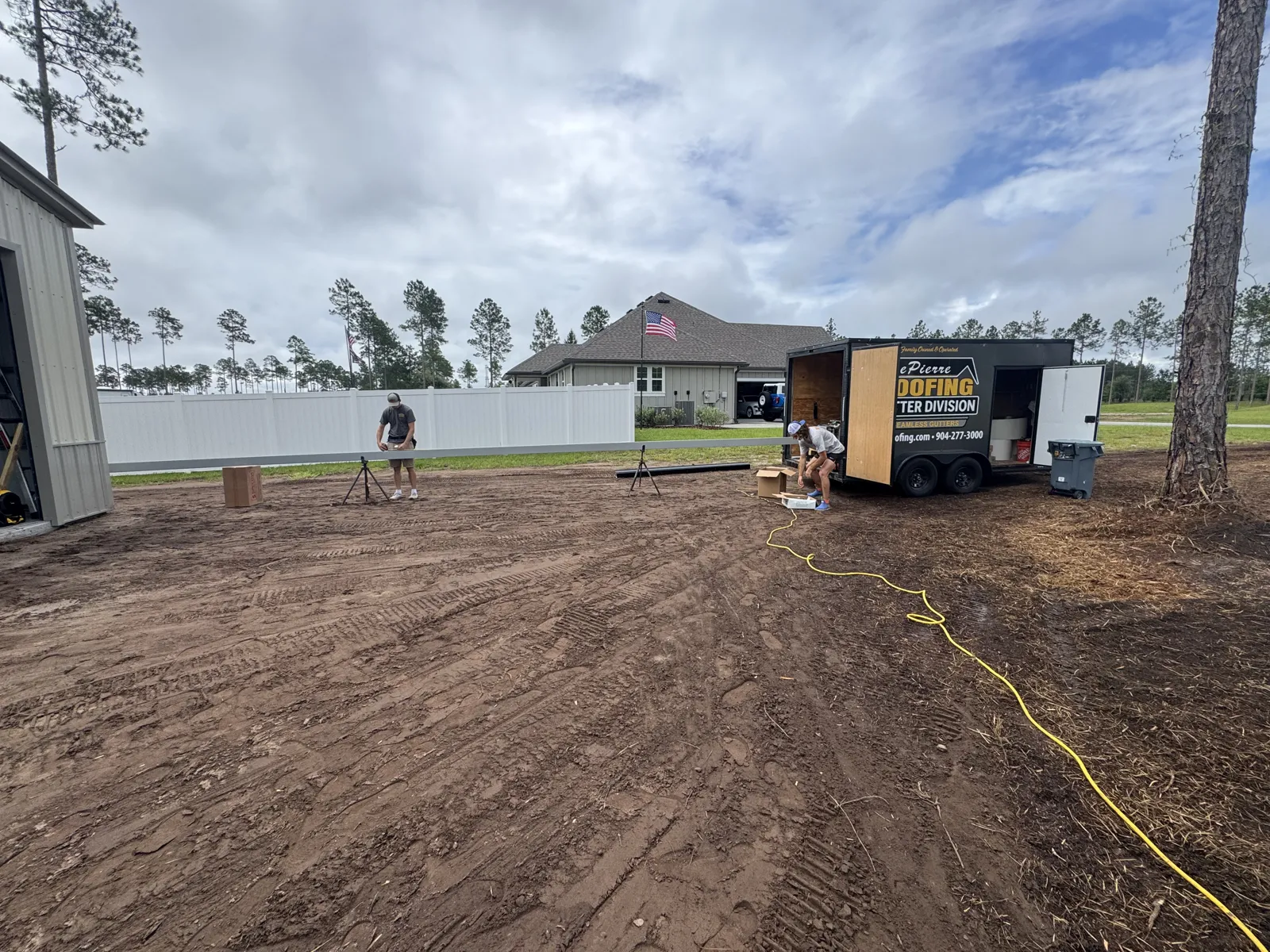 LePierre Gutter Division trailer and crew on a job site